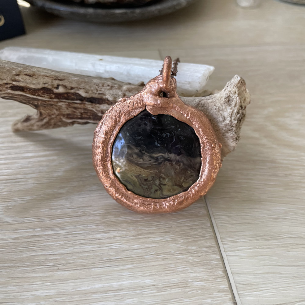 Fossilized Palm Root Scry Mirror with Ouroboros Frame in Copper - Image 2