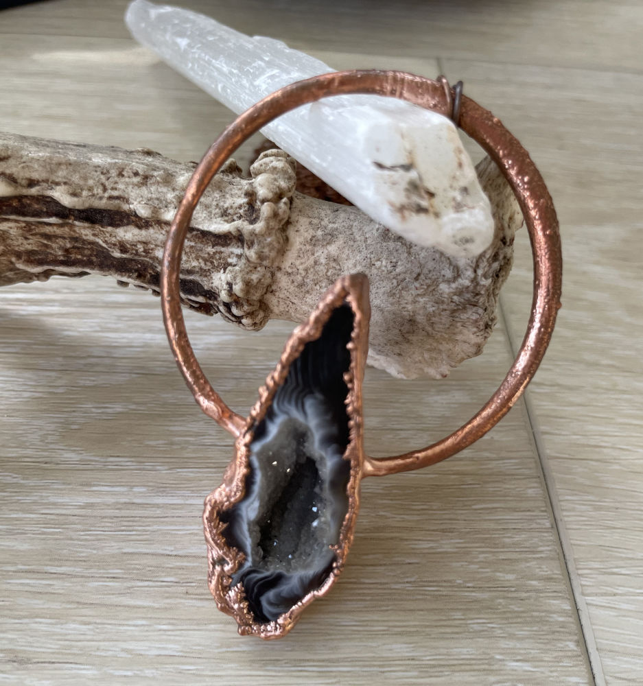 Polished Black Oco Geode in Copper